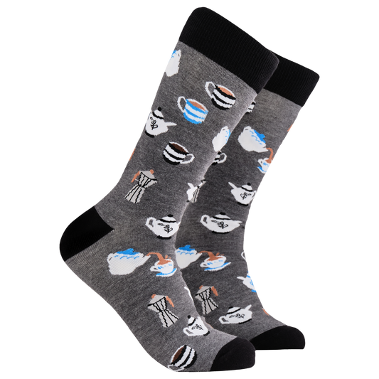  Afternoon Tea Socks. A pair of socks depicting tea cups and tea pots. Grey legs, black cuff, heel and toe.