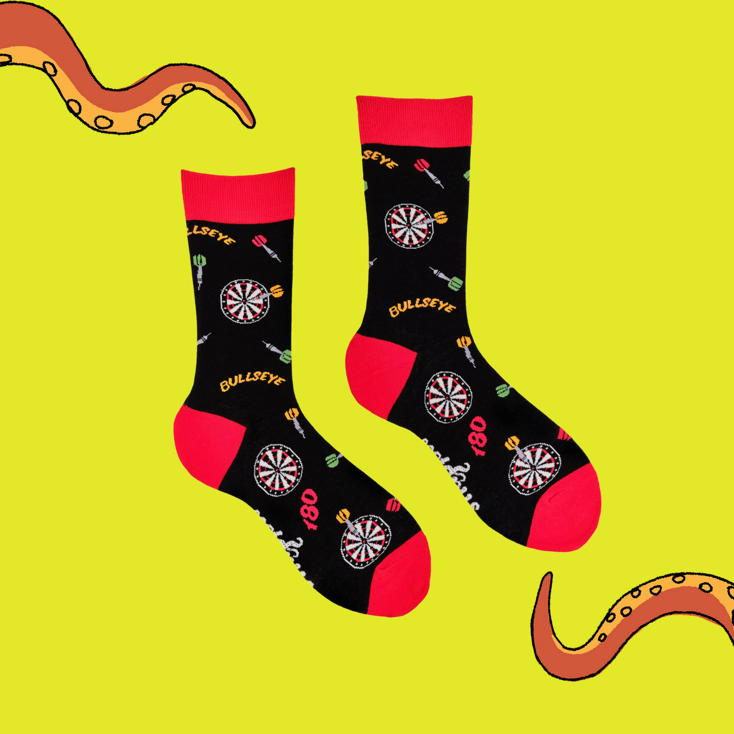 
                  
                    A pair of socks depicting darts and dartboards. Black legs, red cuff, heel and toe.
                  
                