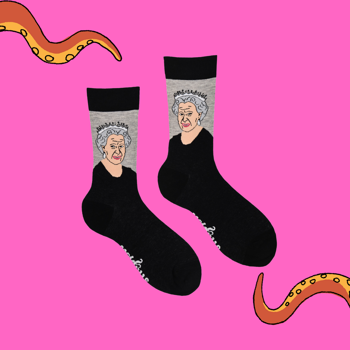 
                  
                    A pair of socks depicting HRH Queen Elizabeth II. Black legs, black cuff, heel and toe.
                  
                