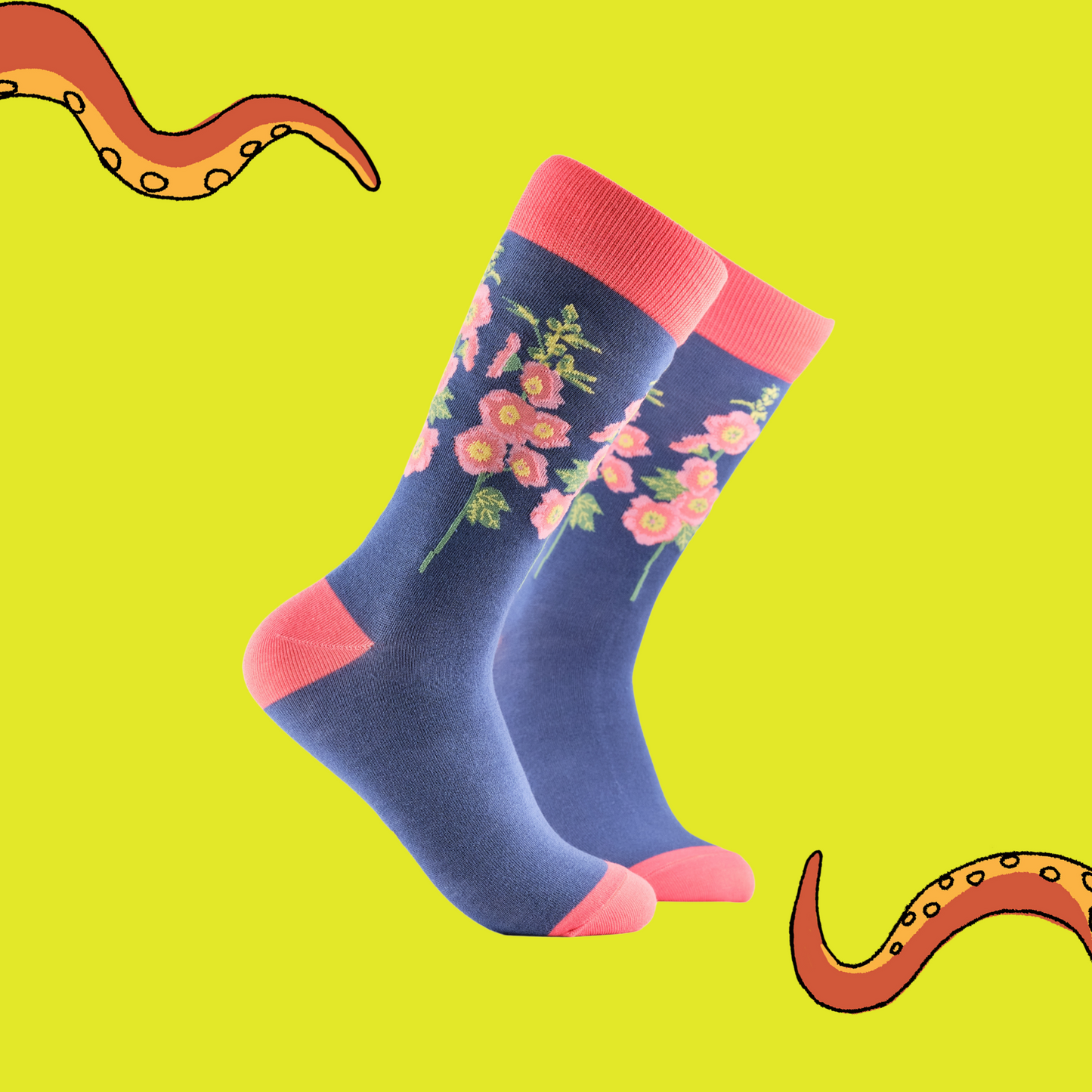 A pair of socks depicting hollyhocks. Blue legs, pink cuff, heel and toe.