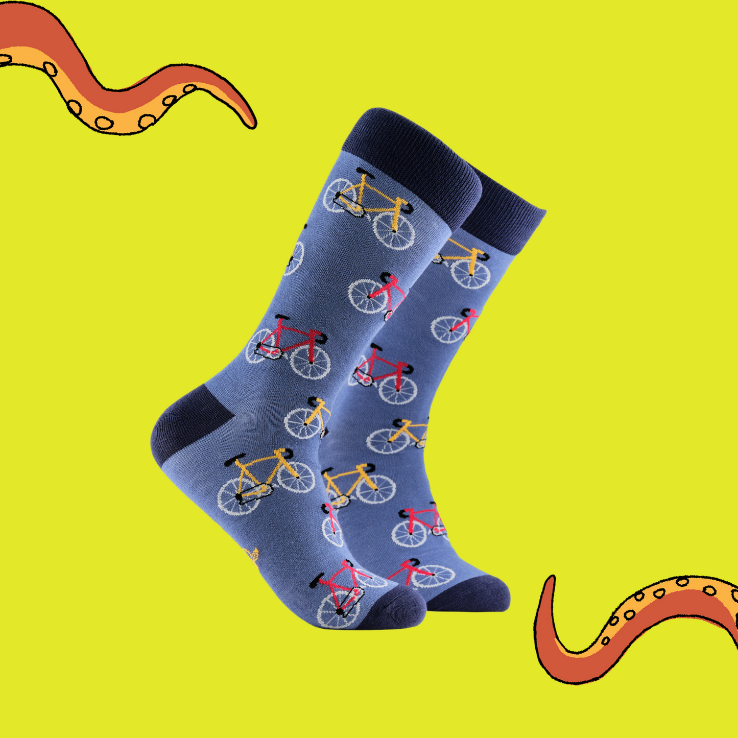 A pair of socks depicting red and yellow bikes. Blue legs, dark blue cuff, heel and toe.