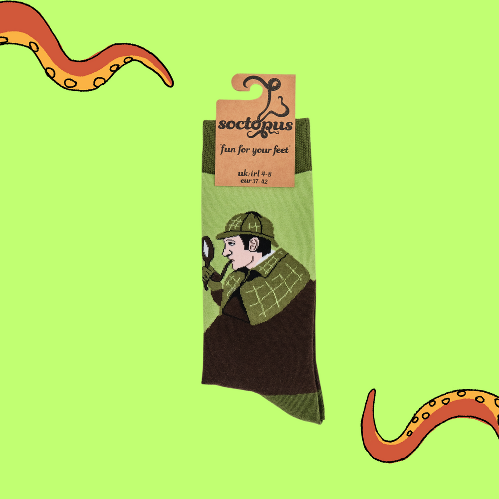 
                  
                     A pair of socks depicting Sherlock Holmes with hat and pipe. Brown legs, green cuff, heel and toe. In Soctopus Packaging.
                  
                