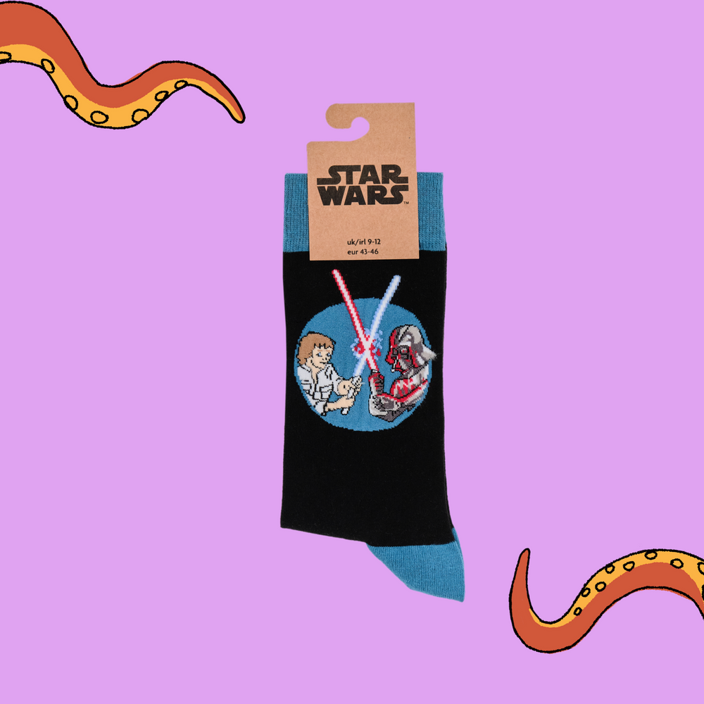 
                  
                    A pair of socks depicting Luke Sywalker and Darth Vader dueling with Lightsabers and featuring the famous scrolling titles. Black legs, blue cuff, heel and toe. In Soctopus Packaging.
                  
                