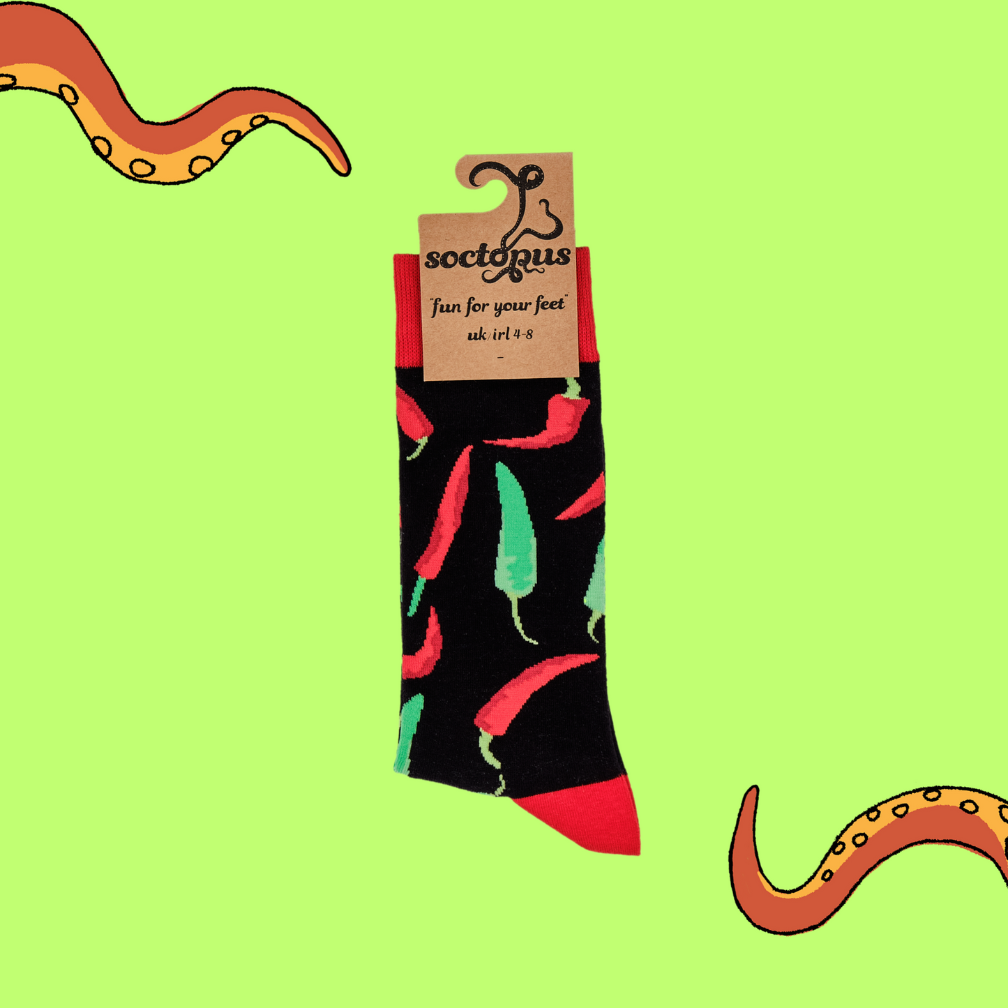 
                  
                    A pair of socks depicting red and green chilli peppers.. Black legs, red cuff, heel and toe. In Soctopus Packaging.
                  
                