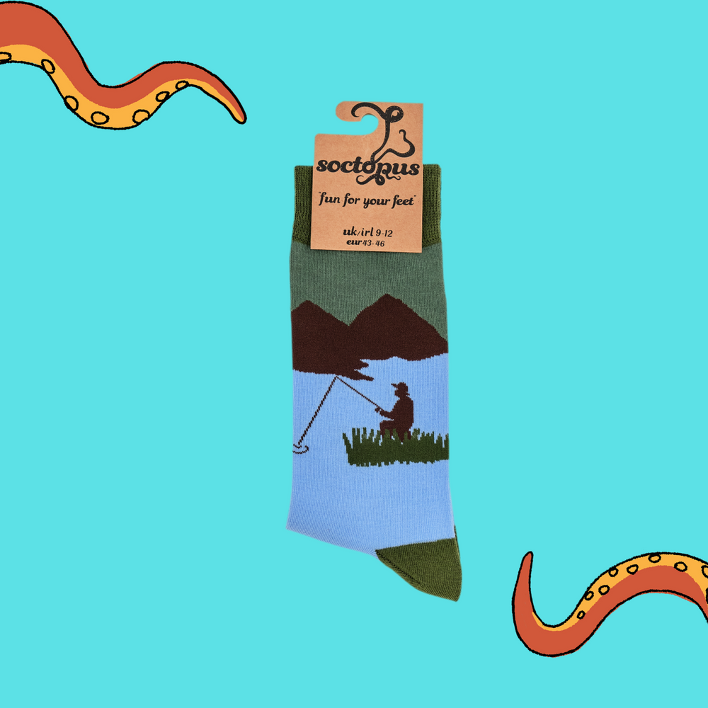 
                  
                    A pair of socks depicting fishermen on the water. Blue legs, green cuff, heel and toe. In Soctopus Packaging.
                  
                