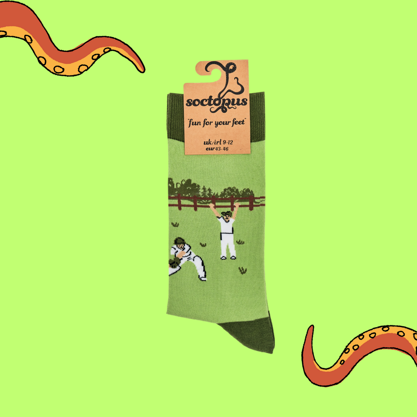 
                  
                    A pair of socks depicting a cricket match. Green legs, dark cuff, heel and toe. In Soctopus Packaging.
                  
                