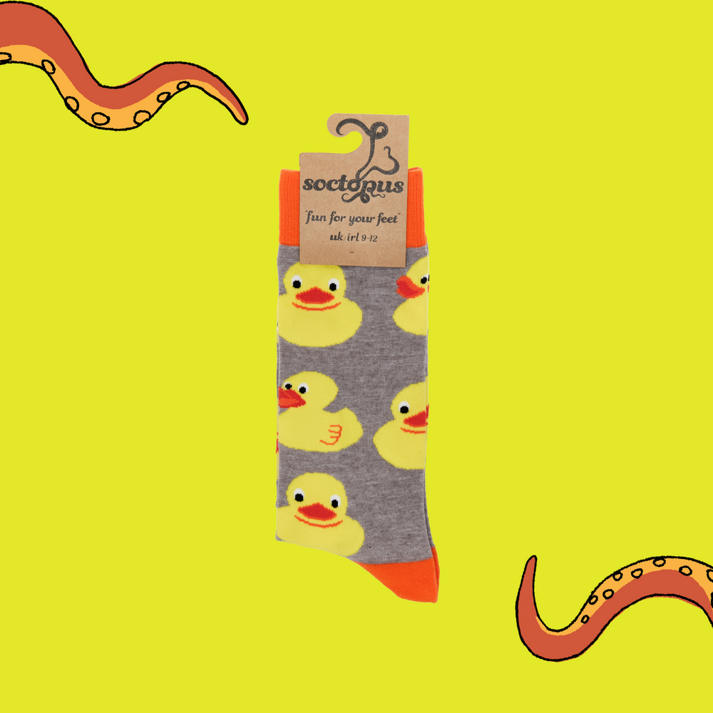 
                  
                    A pair of socks depicting rubber ducks. Grey legs, orange cuff, heel and toe. In Soctopus Packaging.
                  
                