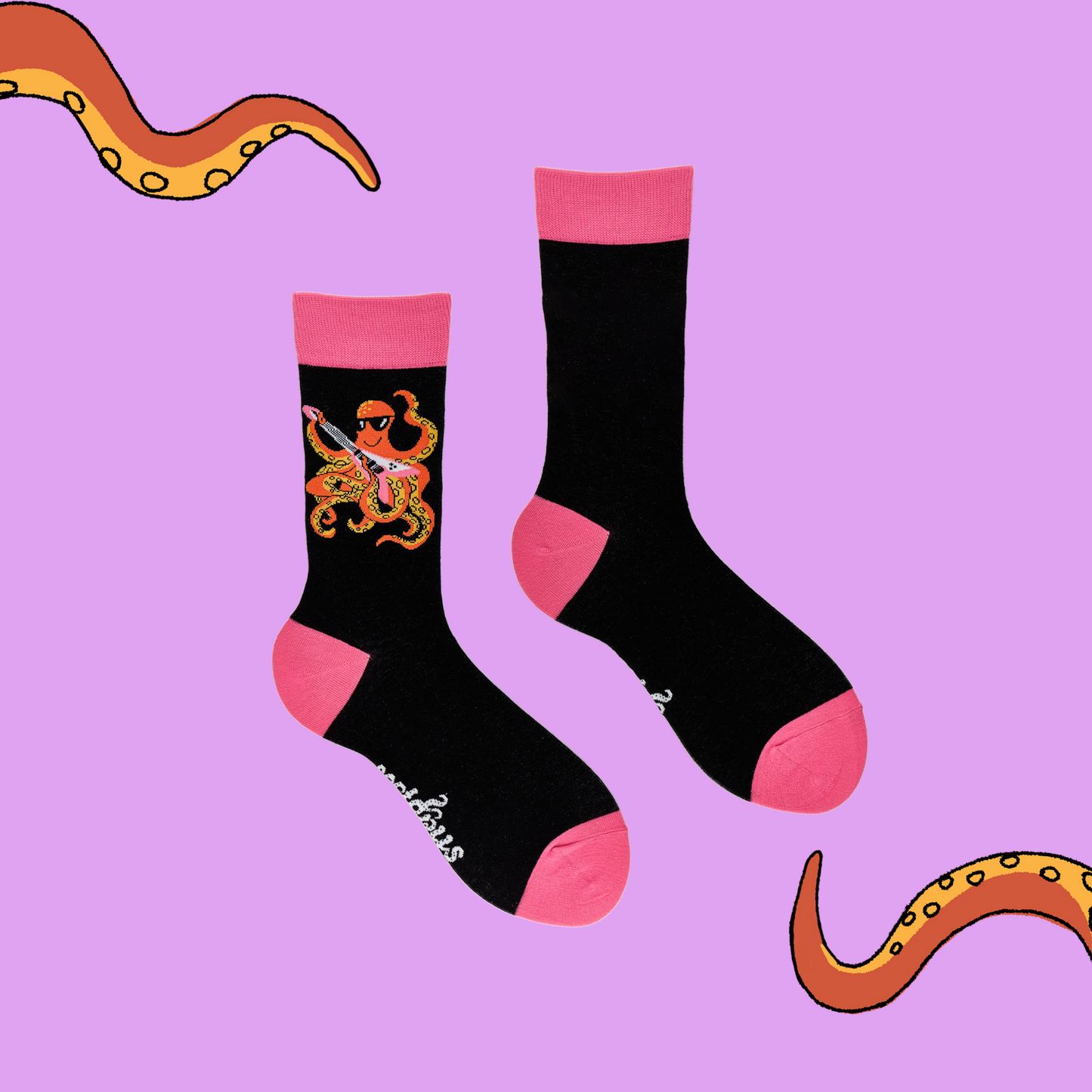 
                  
                    A pair of socks depicting an octopus playing a pink guitar. black legs, pink cuff, heel and toe.
                  
                