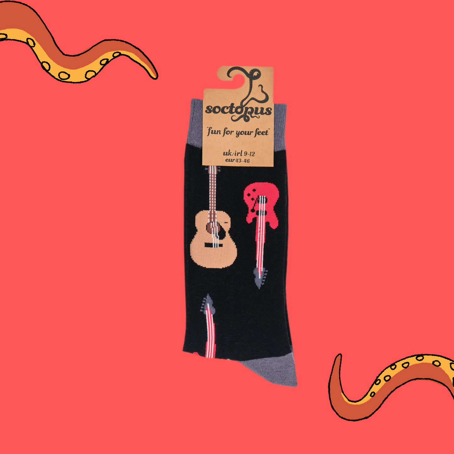 
                  
                    A pair of socks depicting electric and acoustic guitars. Black legs, grey cuff, heel and toe. In Soctopus Packaging.
                  
                