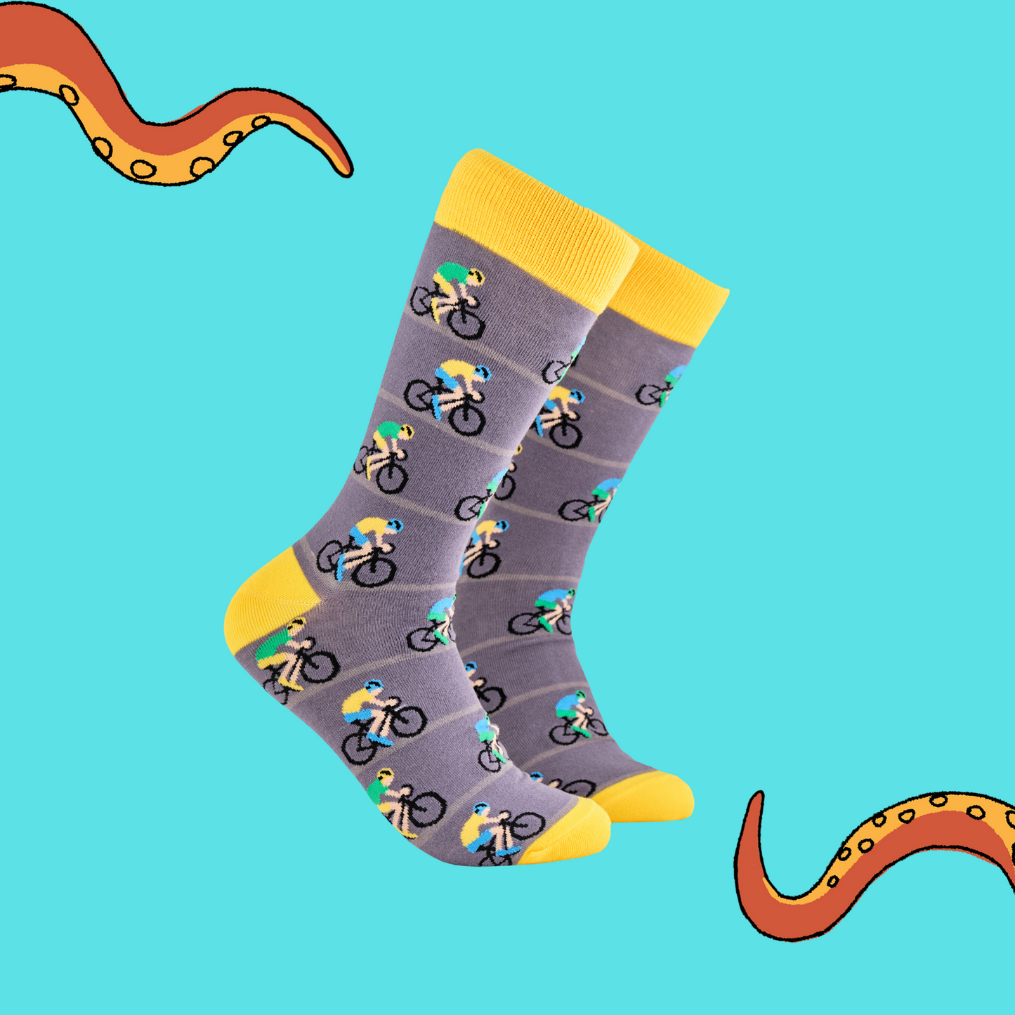 A pair of socks depicting racing cycles. Grey legs, yellow cuff, heel and toe.