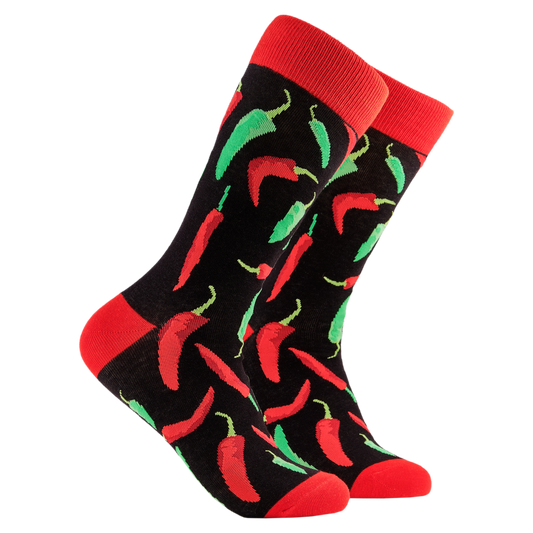 Chilli Socks. A pair of socks depicting red and green chilli peppers.. Black legs, red cuff, heel and toe.