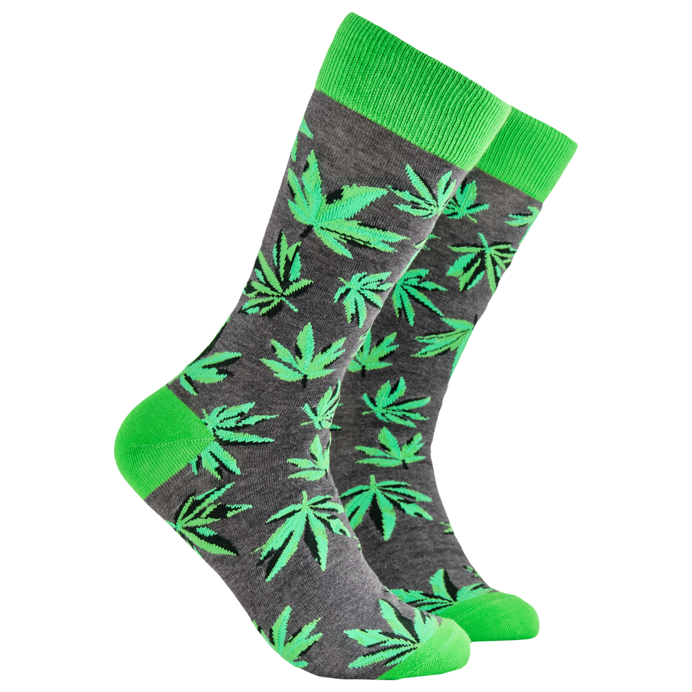 Weed Socks - High Life. A pair of socks depicting cannabis leaves. Grey legs, bright cuff, heel and toe.