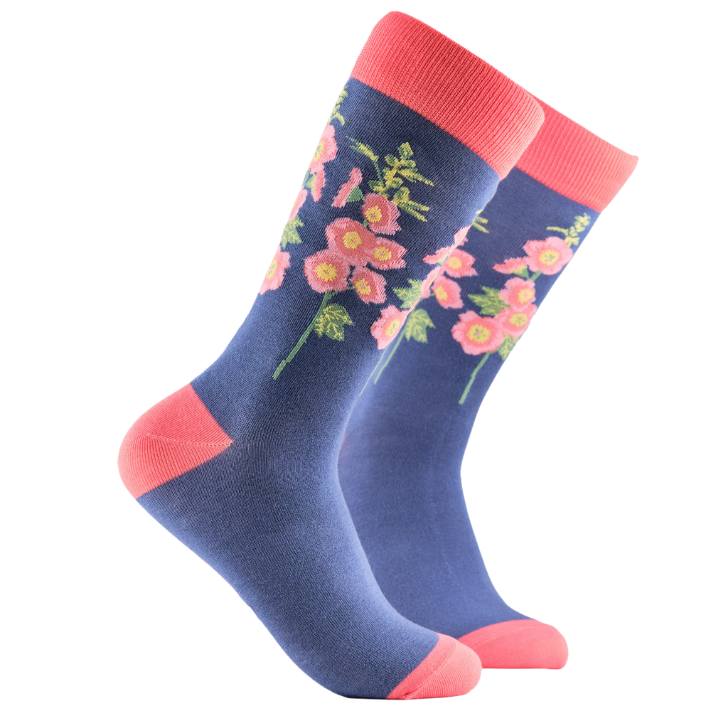 Hollyhocks Floral Bamboo Socks. A pair of socks depicting hollyhocks. Blue legs, pink cuff, heel and toe.
