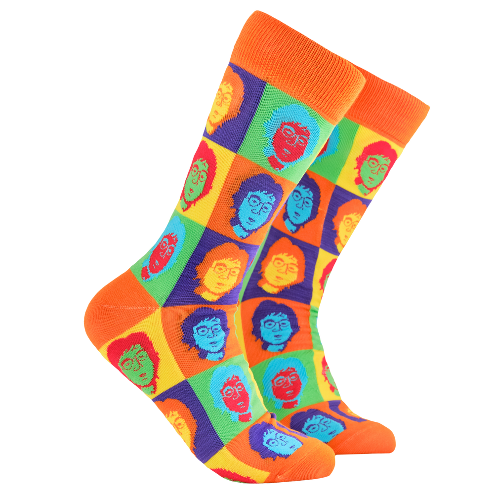 John Lennon Socks. A pair of socks depicting John Lennon's face. Multicoloured legs, orange cuff, heel and toe.
