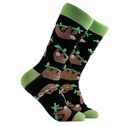 Sloth Socks - Lazy Vibes. A pair of socks depicting lazy sloths. Black legs, green cuff, heel and toe.