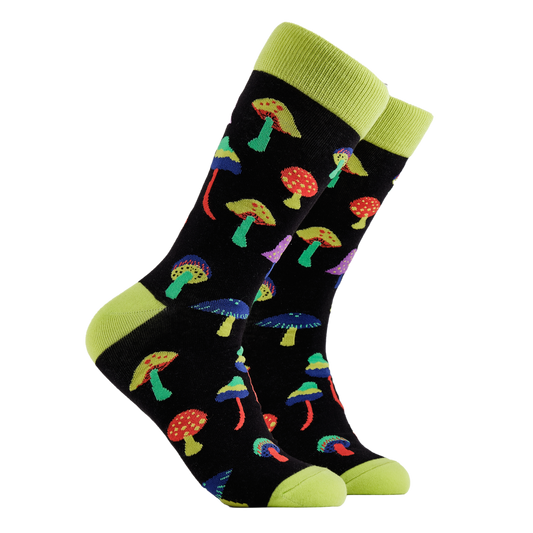Magic Mushroom Socks - Mushroom Trippin'.  A pair of socks depicting magic mushrooms. Black legs, bright yellow cuff, heel and toe.