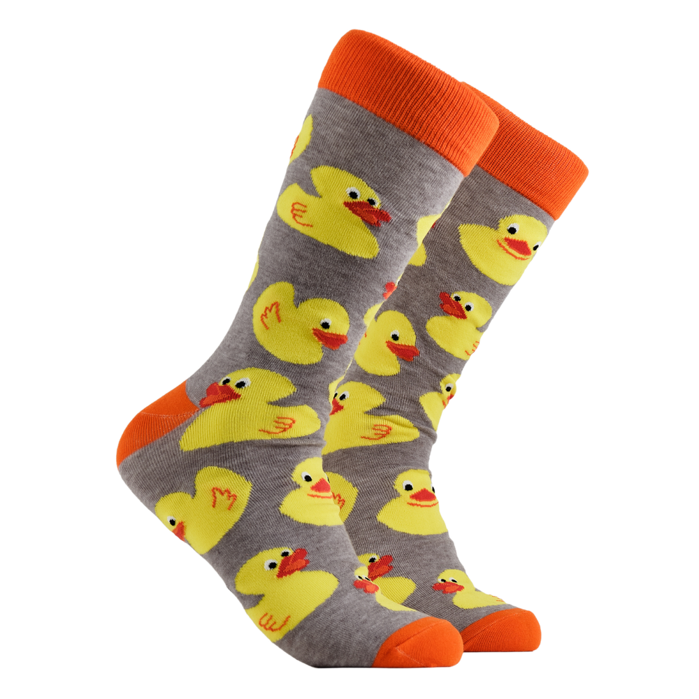 Rubber Duck Socks - Rubber Duckies. A pair of socks depicting rubber ducks. Grey legs, orange cuff, heel and toe.