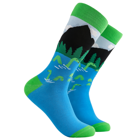 Loch Ness Monster Socks - Sock Ness Monster. A pair of socks depicting the loch ness monster. Blue legs, green cuff, heel and toe.