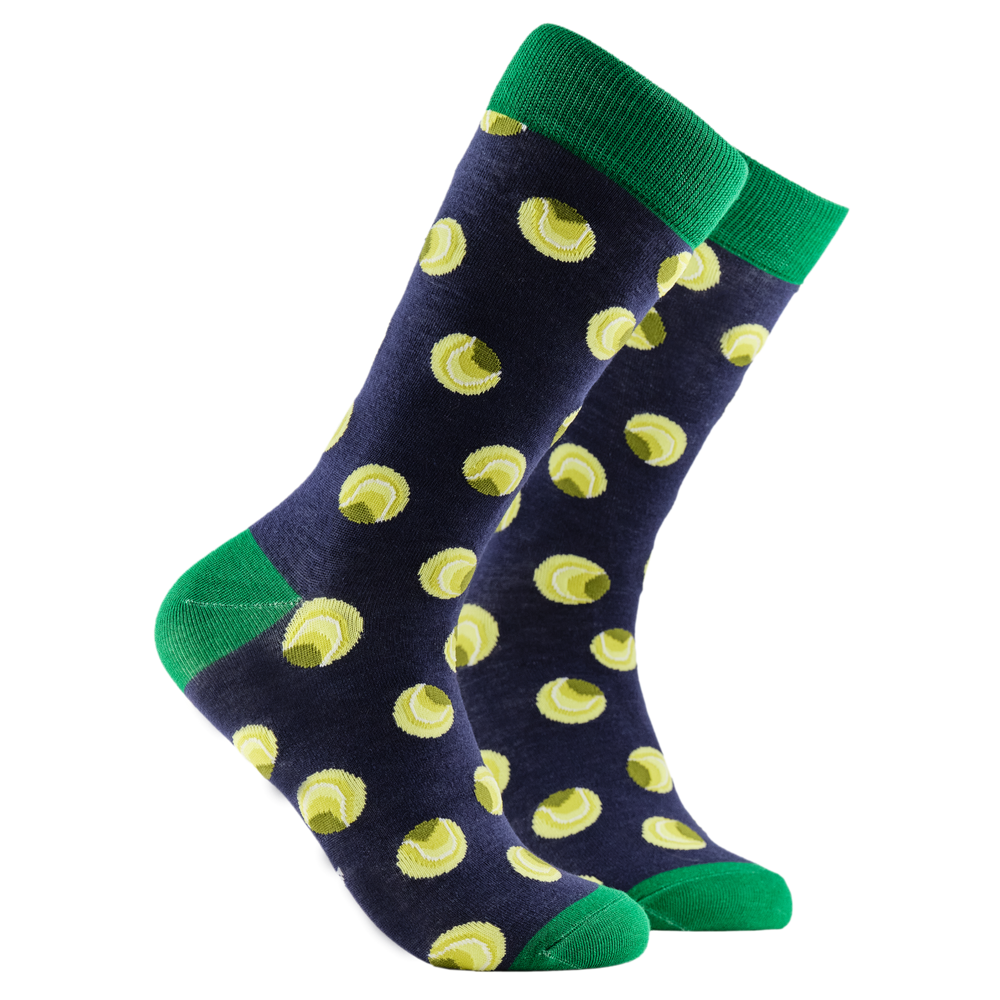 Tennis Balls Bamboo Socks. A pair of socks depicting tennis balls. Navy blue legs, green cuff, heel and toe.