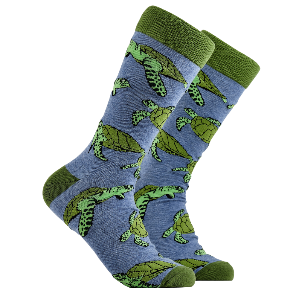 Turtle Socks - Turtle Dude. A pair of socks depicting sea turtles. Blue legs, green cuff, heel and toe.