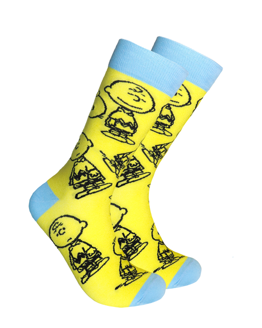 Peanuts Socks - Charlie Brown Yellow. A pair of socks depicting Charlie Brown in all his different moods. Yellow legs, blue cuff, heel and toe.