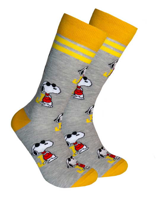 Peanuts Socks - Snoopy Joe Cool. A pair of socks depicting Snoopy as Joe Cool. Grey legs, yellow cuff, heel and toe.