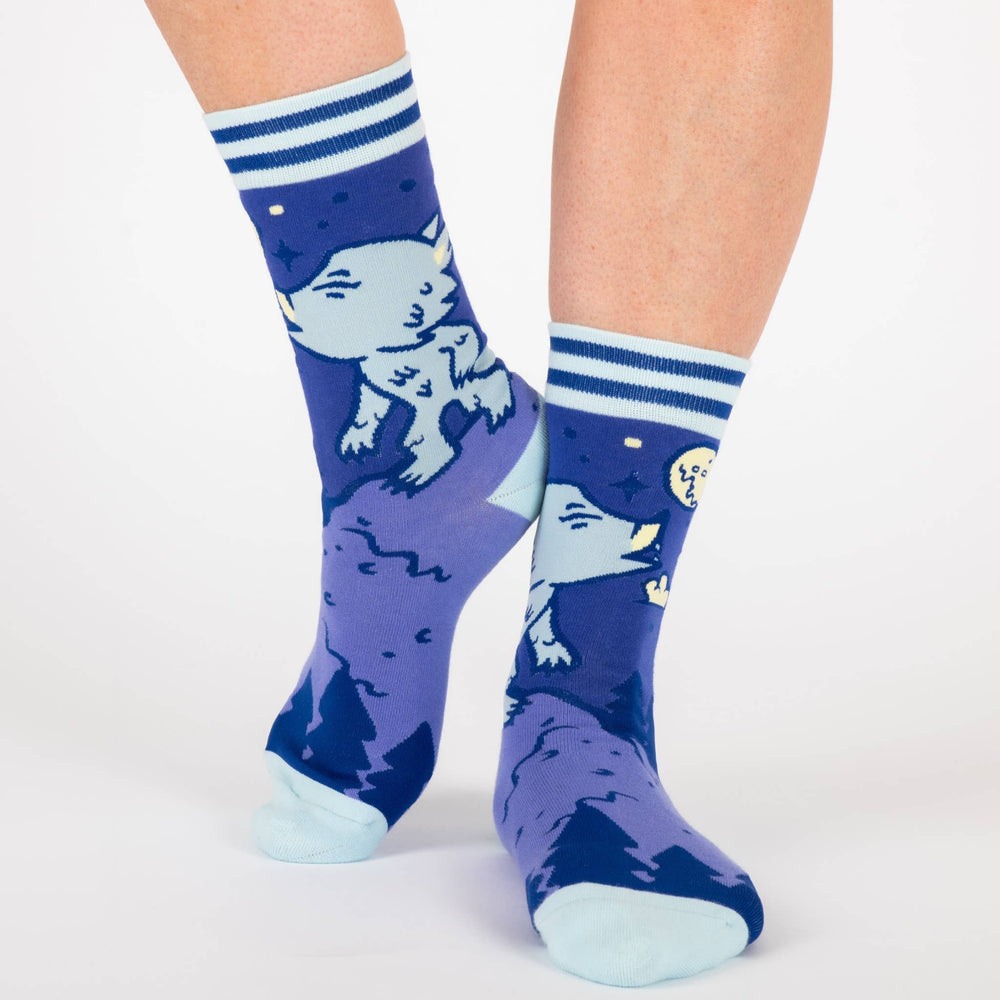 
                  
                    A pair of socks with a cool cute werewolf motif. Cream toes, heel and cuff. 
                  
                