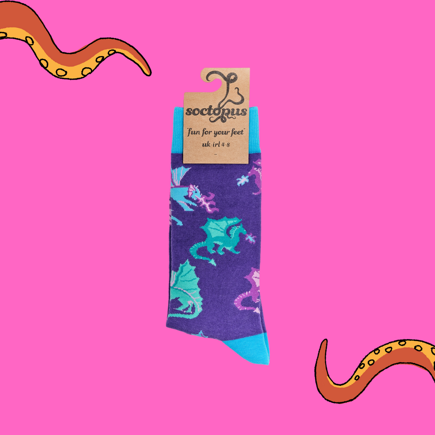 
                  
                    A pair of socks depicting fire breathing dragons. Purple legs, turquoise cuff, heel and toe. In Soctopus Packaging.
                  
                