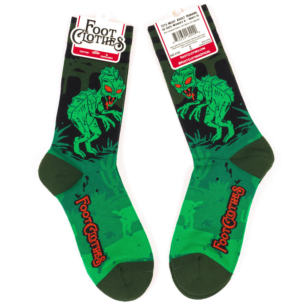 
                      
                        A pair of socks featuring El Chupacabra. Green legs, heel, toe and cuff. 
                      
                    