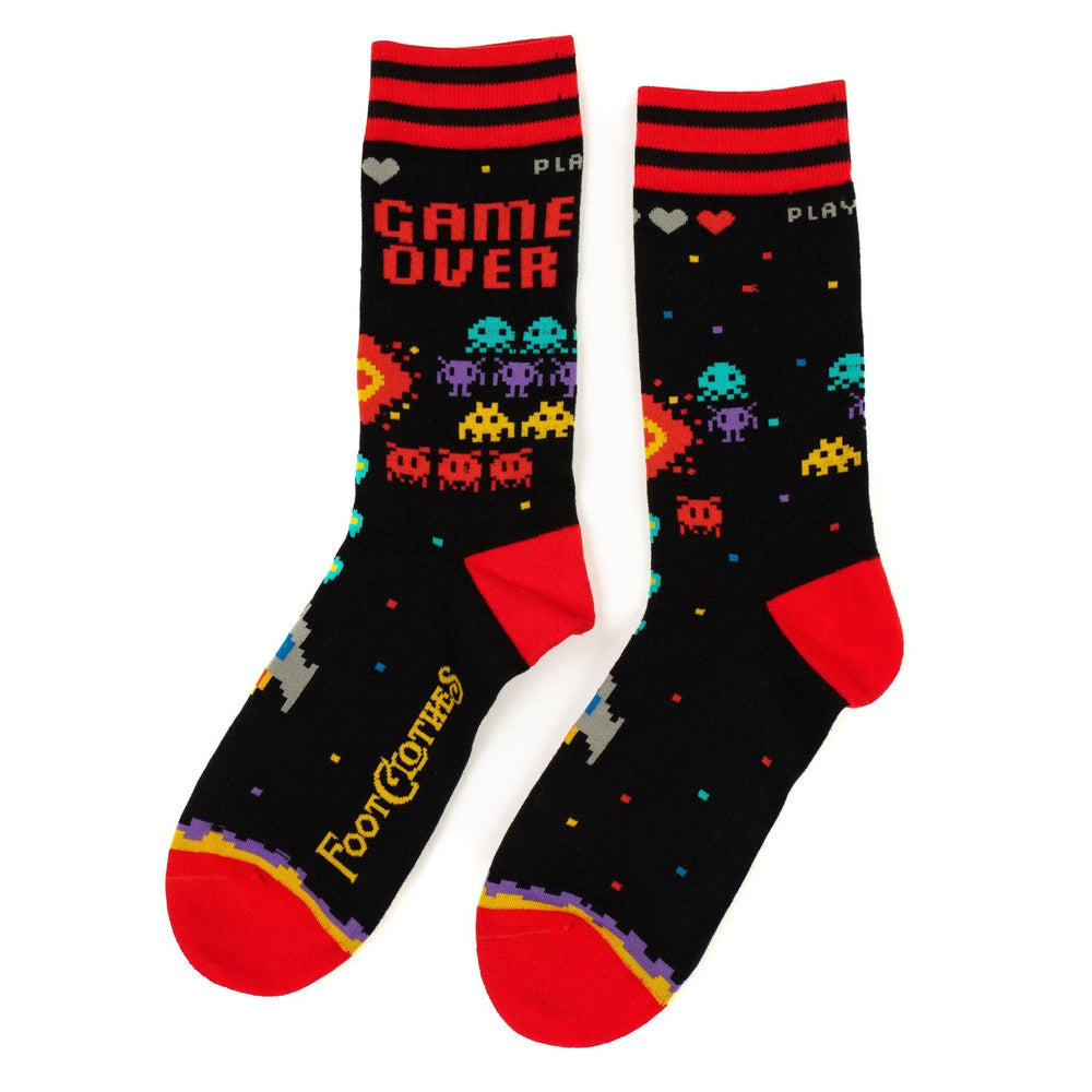 
                      
                        A pair of socks featuring space invaders and game over. Black legs, red heel, toe and cuff. 
                      
                    