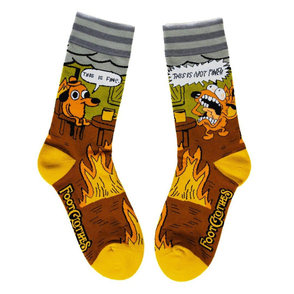 
                      
                        A pair of socks featuring a design by KC Green. Brown flaming legs, yellow heel, toe and cuff. 
                      
                    