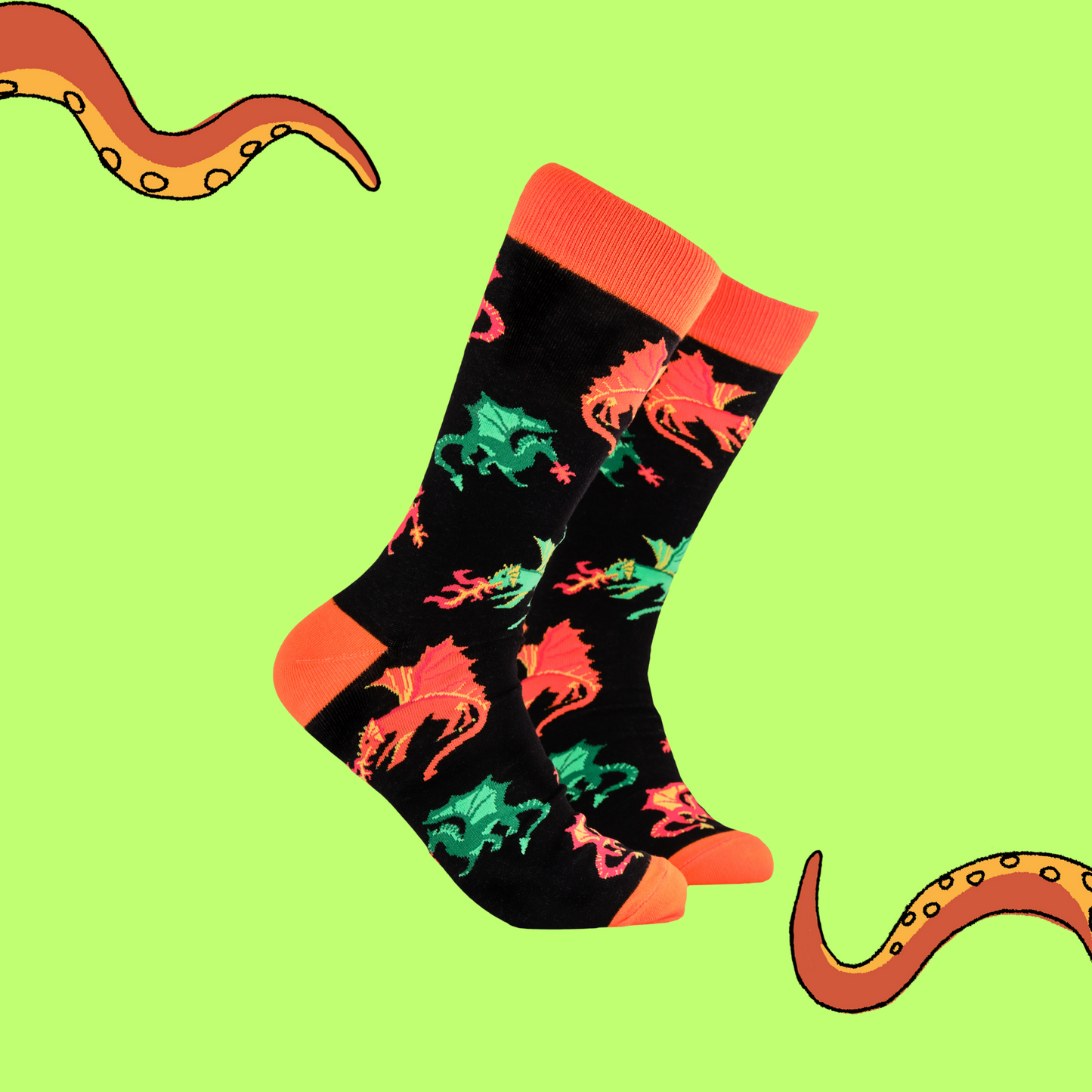A pair of socks depicting fire breathing dragons. Black legs, orange cuff, heel and toe.