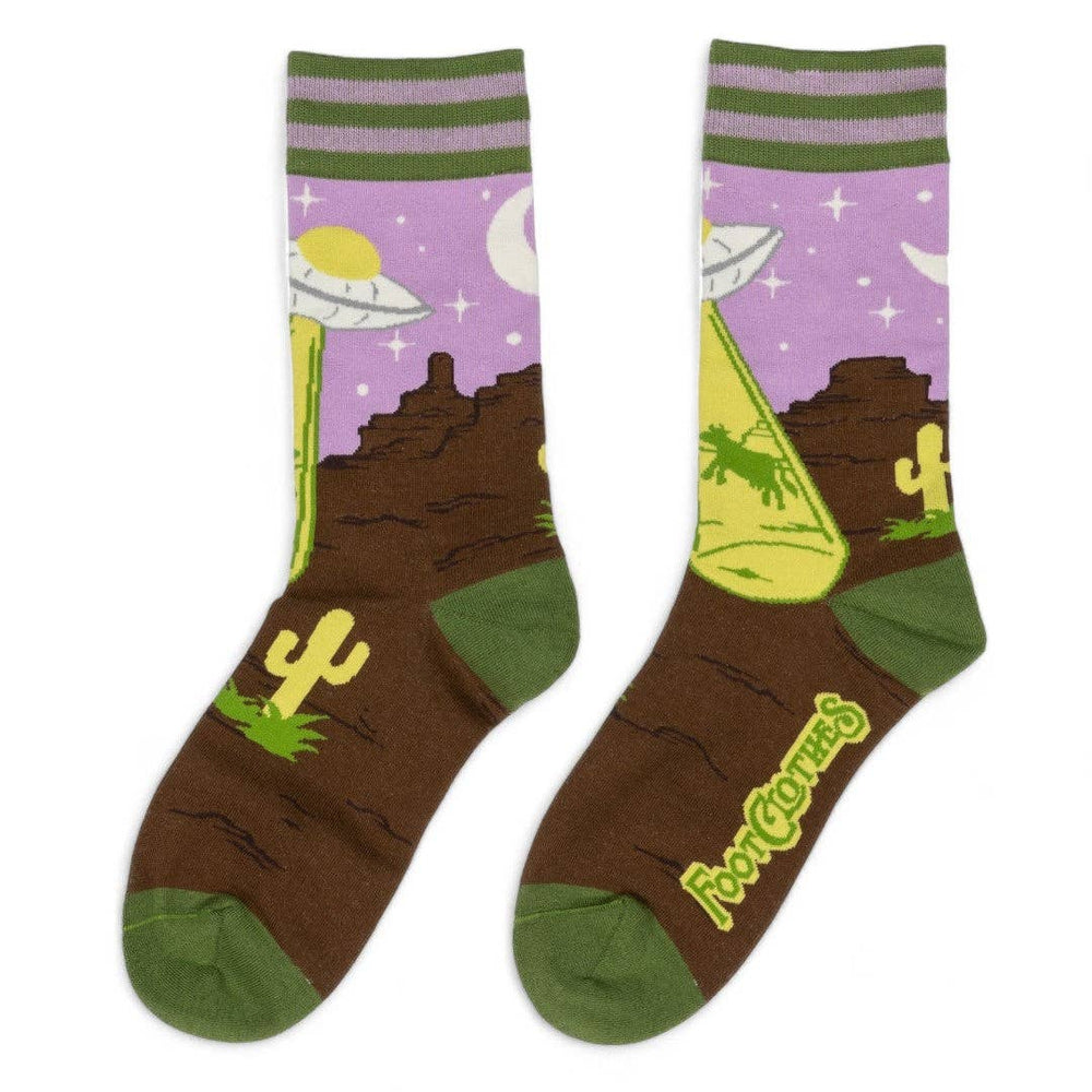 
                      
                        A pair of socks featuring a UFO and a very confused cow. Brown legs, green heel, toe and cuff. 
                      
                    