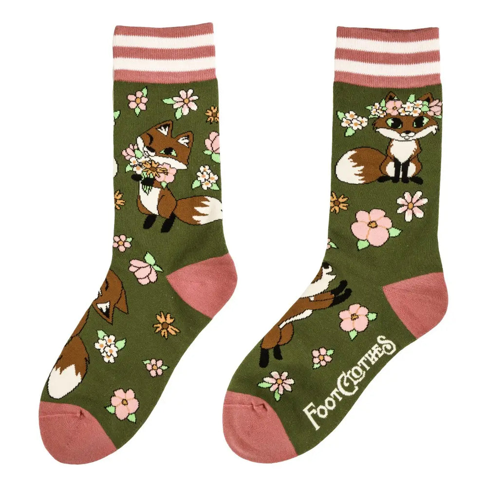 
                      
                        A pair of socks featuring cute woodland foxes. Green legs, pink heel, toe and cuff. 
                      
                    