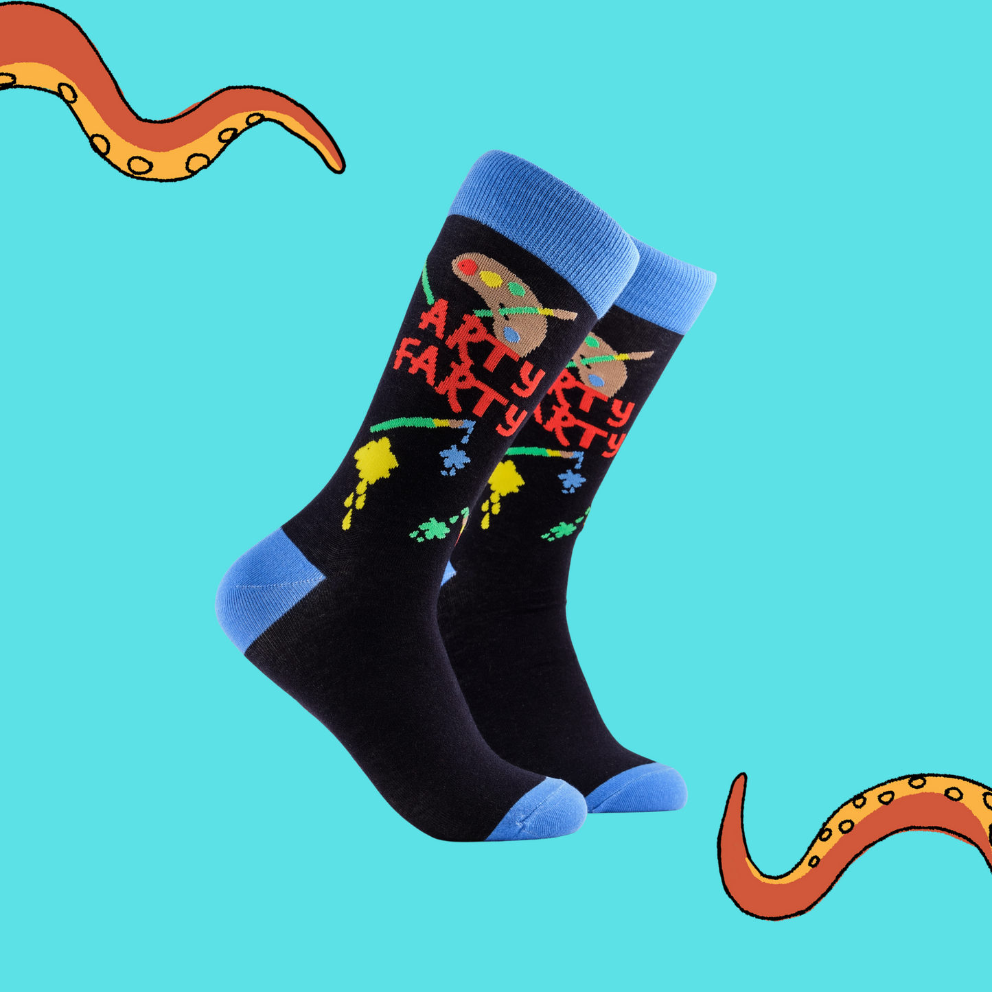Art Socks - Arty Farty. A pair of socks depicting an artist pallet and paint splashes. Dark blue legs, light blue cuff, heel and toe.