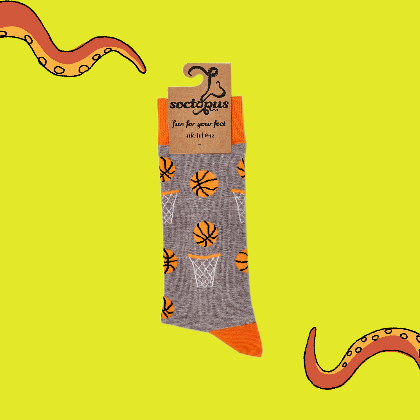 
                  
                    A pair of socks depicting basketballs. Grey legs, orange cuff, heel and toe.In Soctopus Packaging.
                  
                