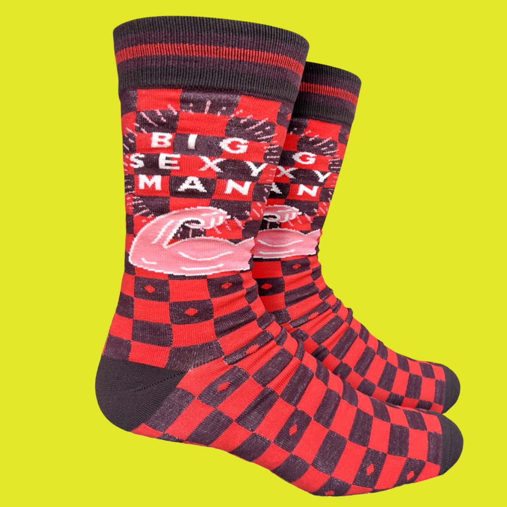 
                      
                        A pair of socks celebrating big, sexy men. Black and red check egs. Black toe, heel and cuff. 
                      
                    