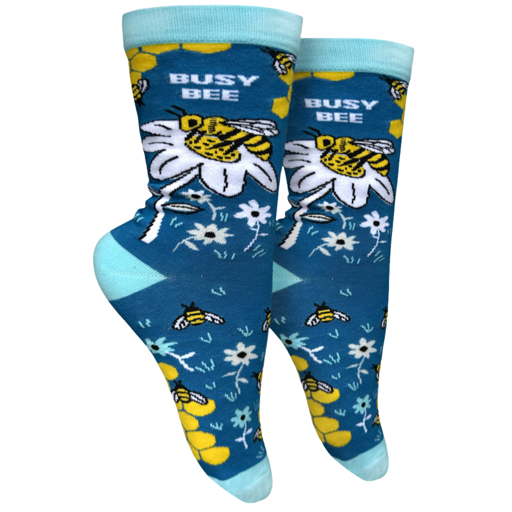 
                  
                    A pair of socks depicting busy bees. Light blue heel, toe and cuff.
                  
                