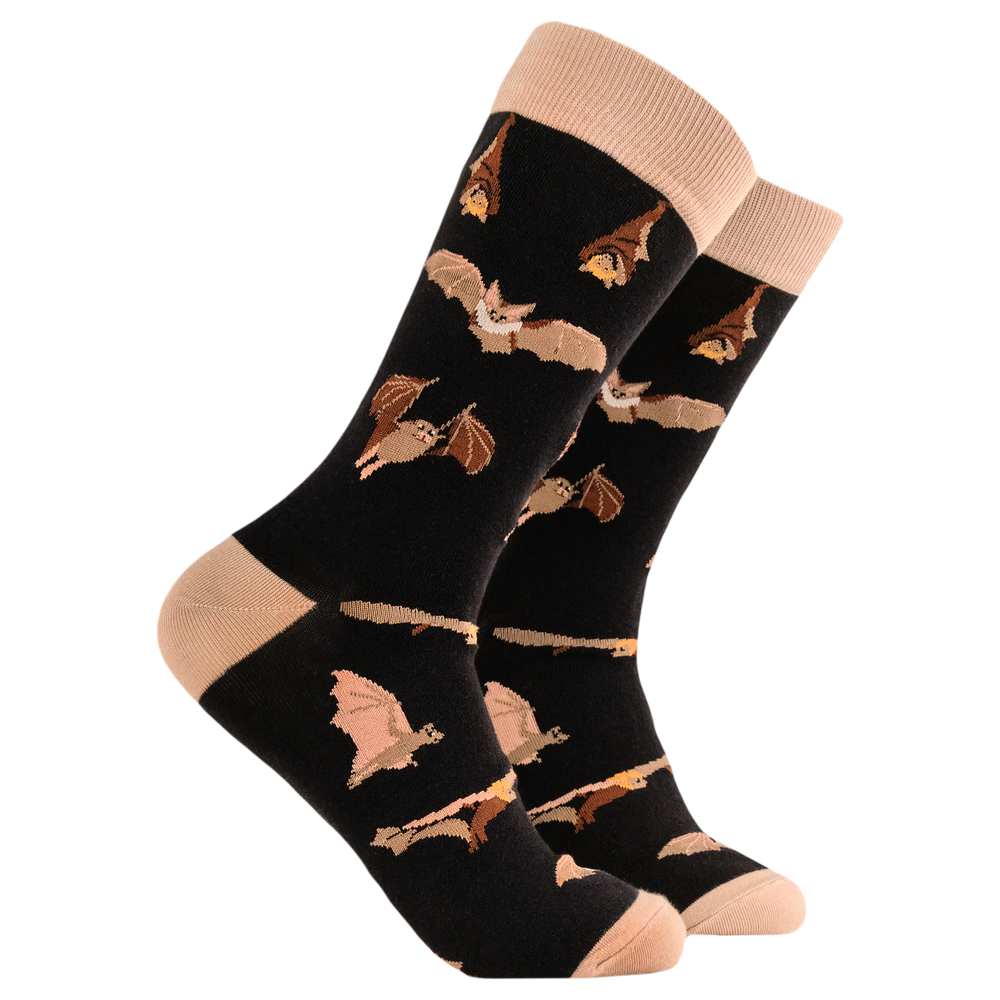 
                      
                        Bat Crazy Socks. A pair of socks featuring a bat motif. Dark brown legs, light brown heel, toe and cuff. 
                      
                    