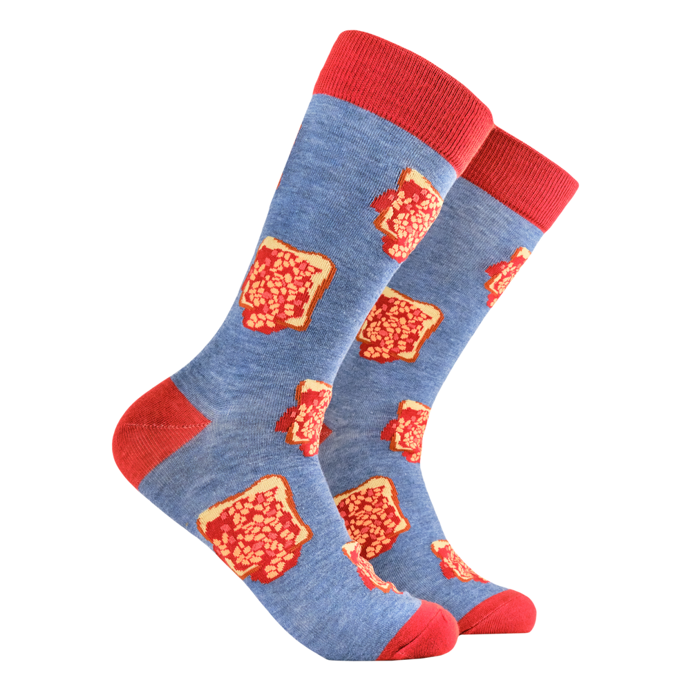 
                      
                        Beans on Toast Socks. A pair of socks depicting beans on toast. Blue legs, red heel, toe and cuff. 
                      
                    