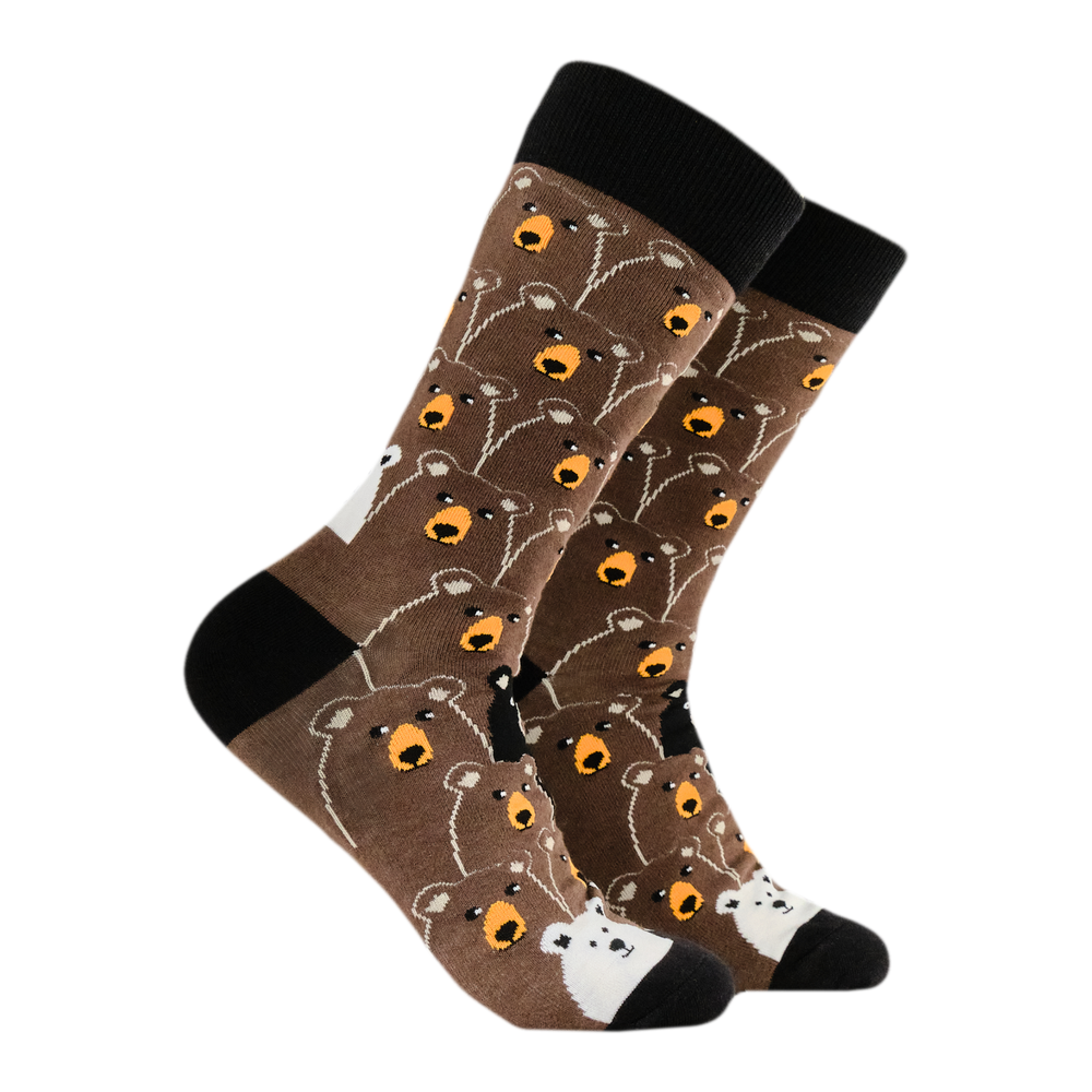 
                      
                        A pair of socks with a fun bear pattern. Brown legs, black heel, toe and cuff. 
                      
                    