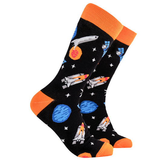 Space Socks - Blast Off. A pair of socks depicting space craft in space. Black legs, orange cuff, heel and toe.