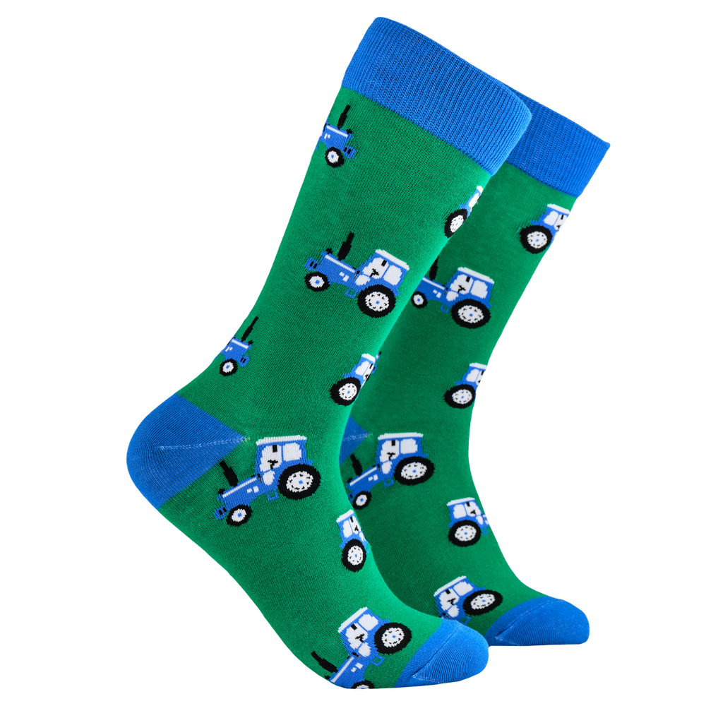 Farming Socks - Blue Tractor. A pair of socks depicting blue tractors. Green legs, blue cuff, heel and toe.