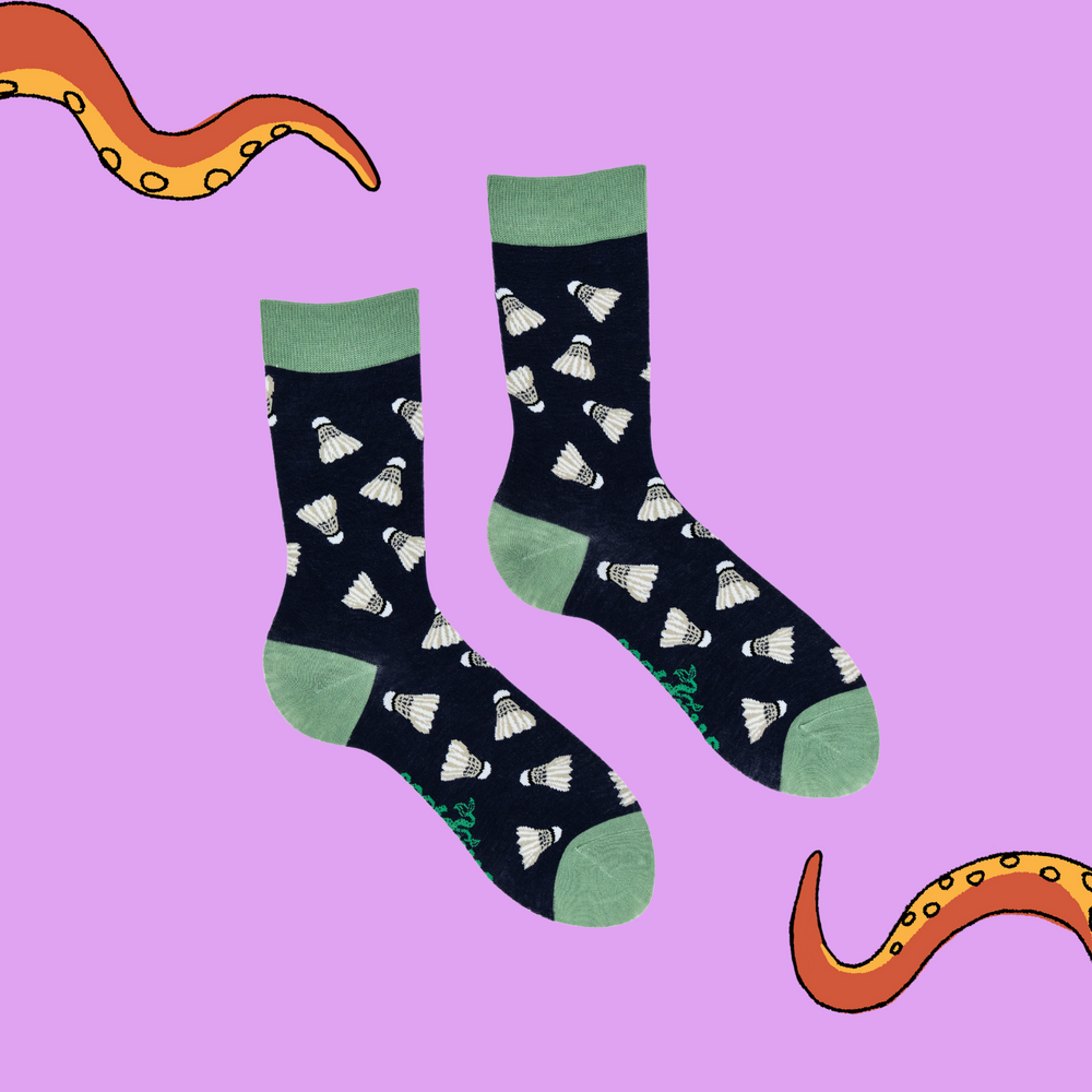 
                      
                        A pair of socks depicting shuttlecocks. Dark blue legs, green cuff, heel and toe.
                      
                    