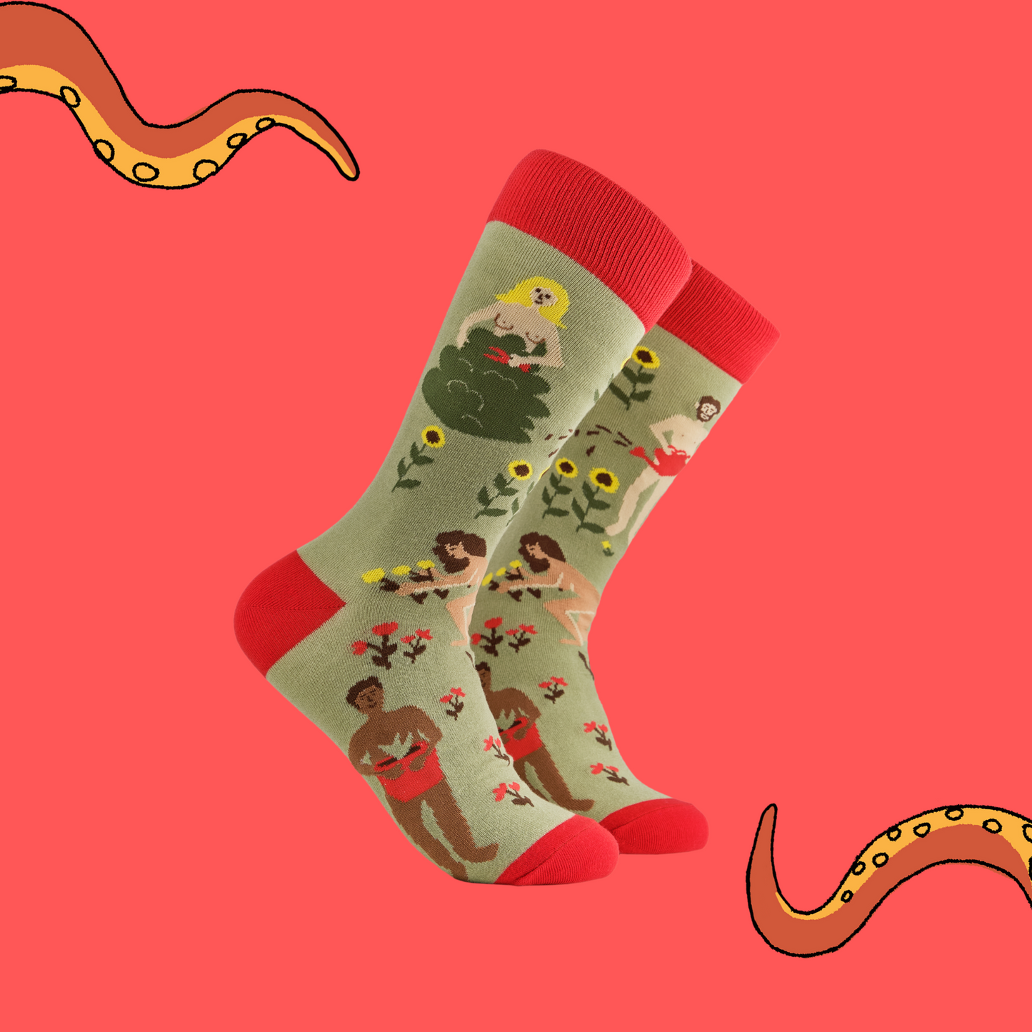 A pair of socks depicting naked gardeners. Green legs, red cuff, heel and toe.