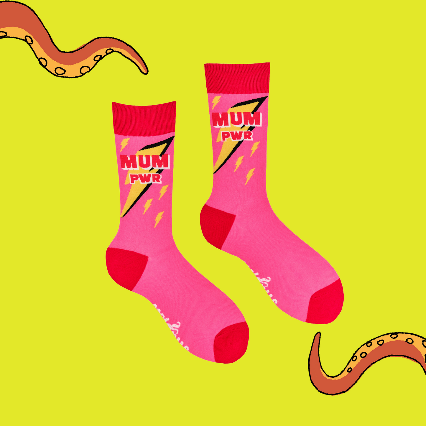 
                  
                    A pair of socks depicting lightning bolts and the words MUM PWR. Pink legs, red cuff, heel and toe.
                  
                