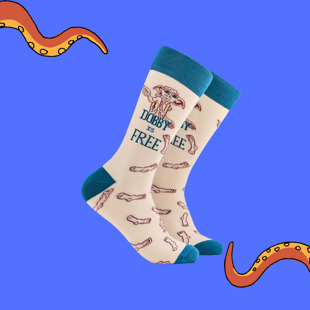 A pair of socks depicting Dobby the house elf. Cream legs, blue cuff, heel and toe.