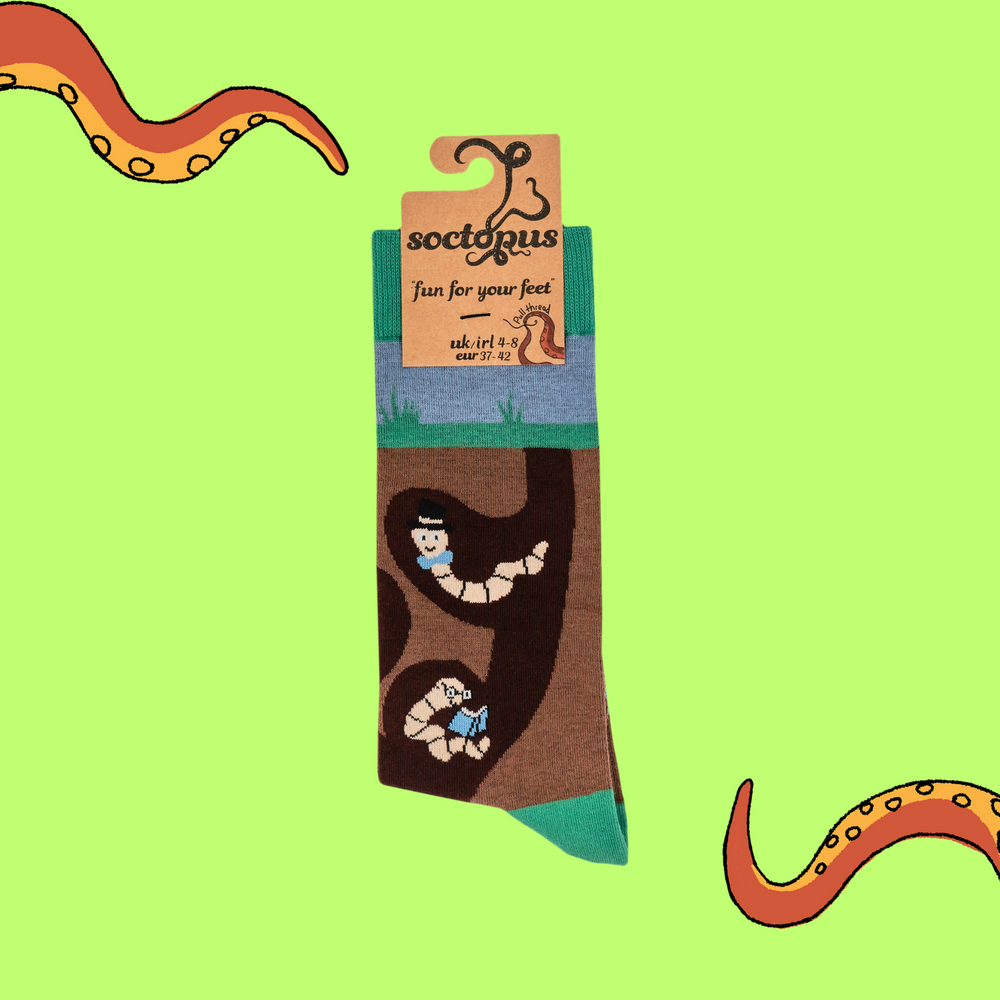 
                      
                        Wormery Socks. A pair of socks featuring earthworms. Brown legs, green heel, toe and cuff. 
                      
                    