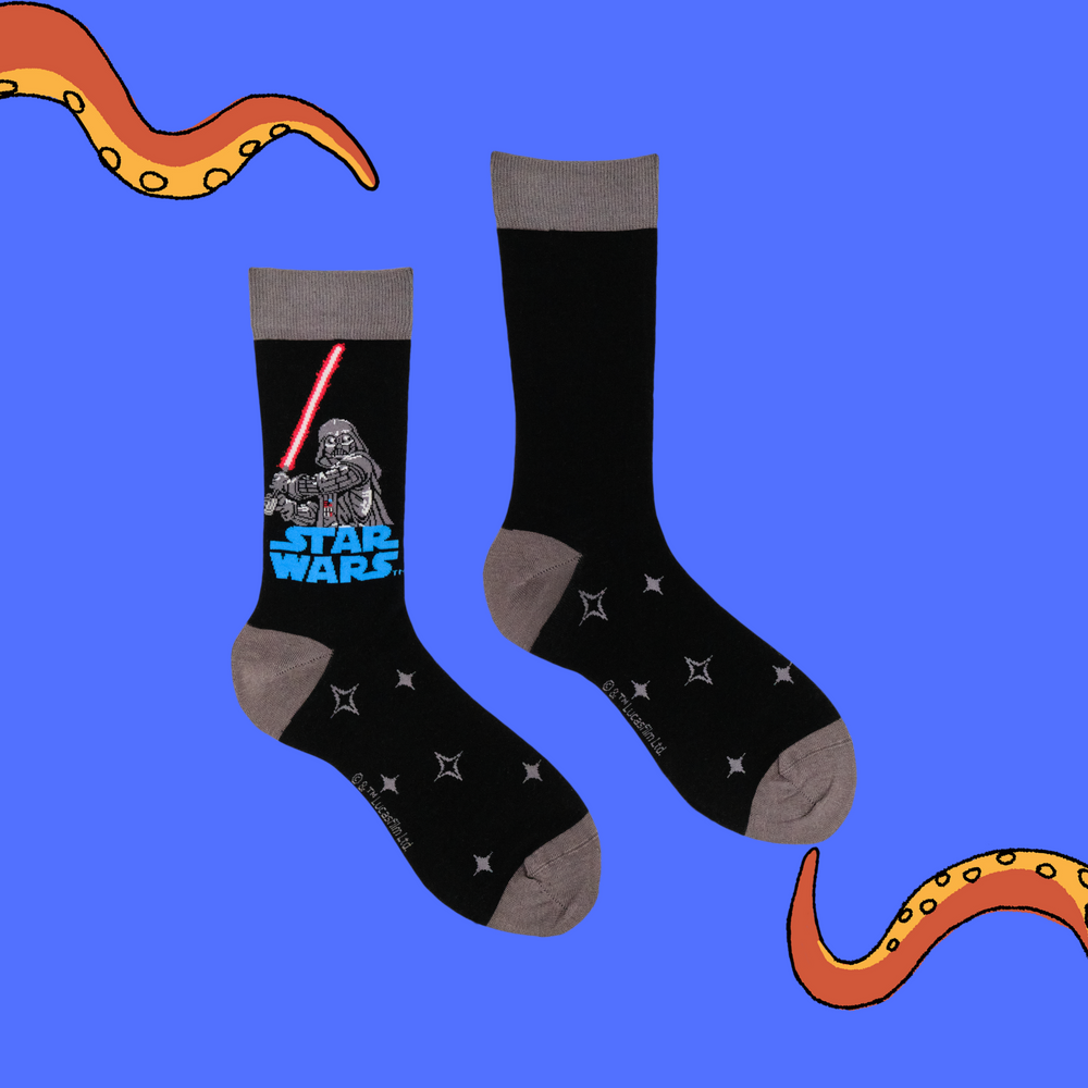 
                      
                        A pair of socks featuring Darth Vader. Black legs, grey toe, heel and cuff. 
                      
                    