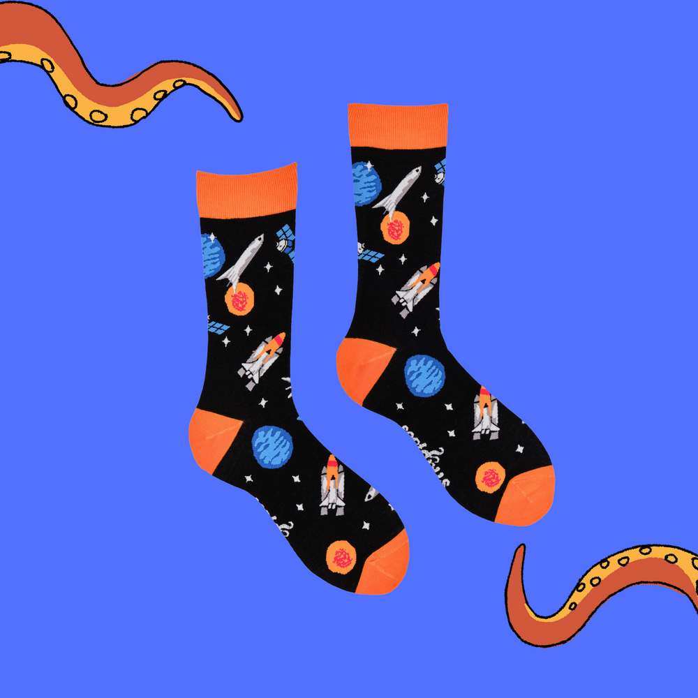 
                      
                        A pair of socks depicting space craft in space. Black legs, orange cuff, heel and toe.
                      
                    